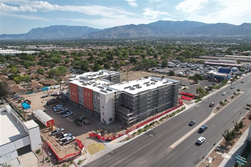 Farolito with mountains in the background
